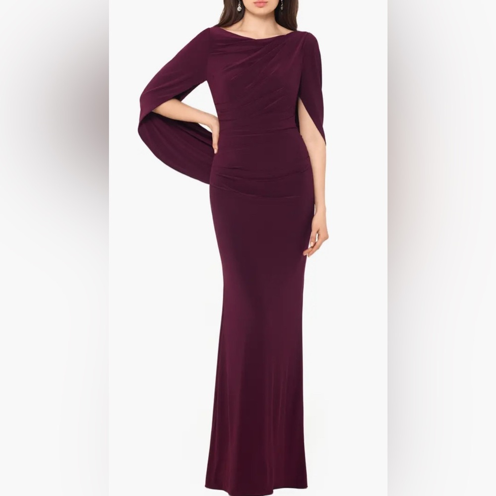 Wine Cape Long Sleeve Trumpet Gown
Betsy & Adam - Picture 3 of 7